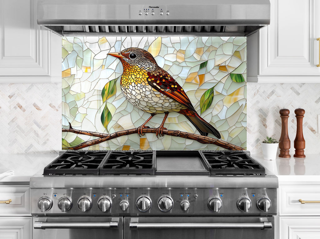 Nature-inspired backsplash glass with colorful perched bird, bringing charm and tranquility to modern kitchens.

