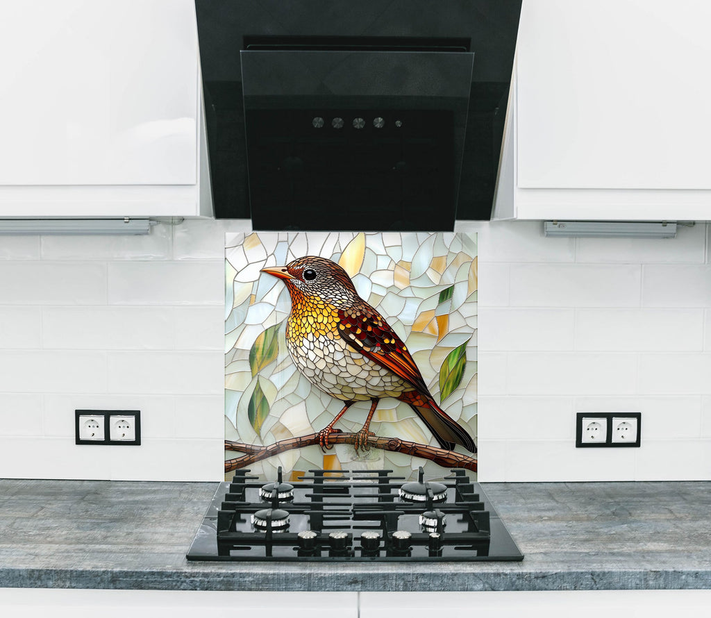 Backsplash glass art featuring a vibrant bird design, perfect for adding elegance and warmth to kitchen spaces.

