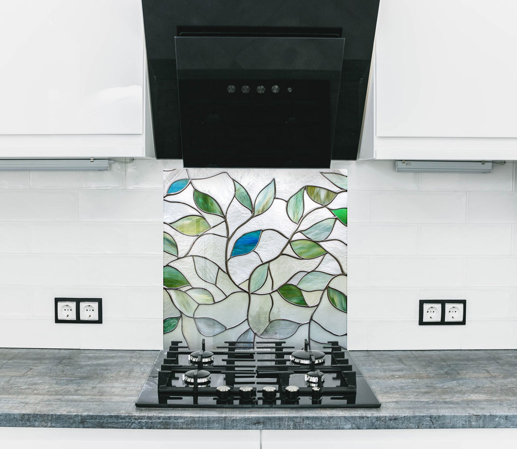 Nature inspired stained glass leaf backsplash glass art with green and blue accents for kitchen walls

