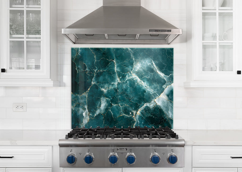 Emerald green marble effect glass kitchen backsplash with fine gold veining – bold and luxurious.

