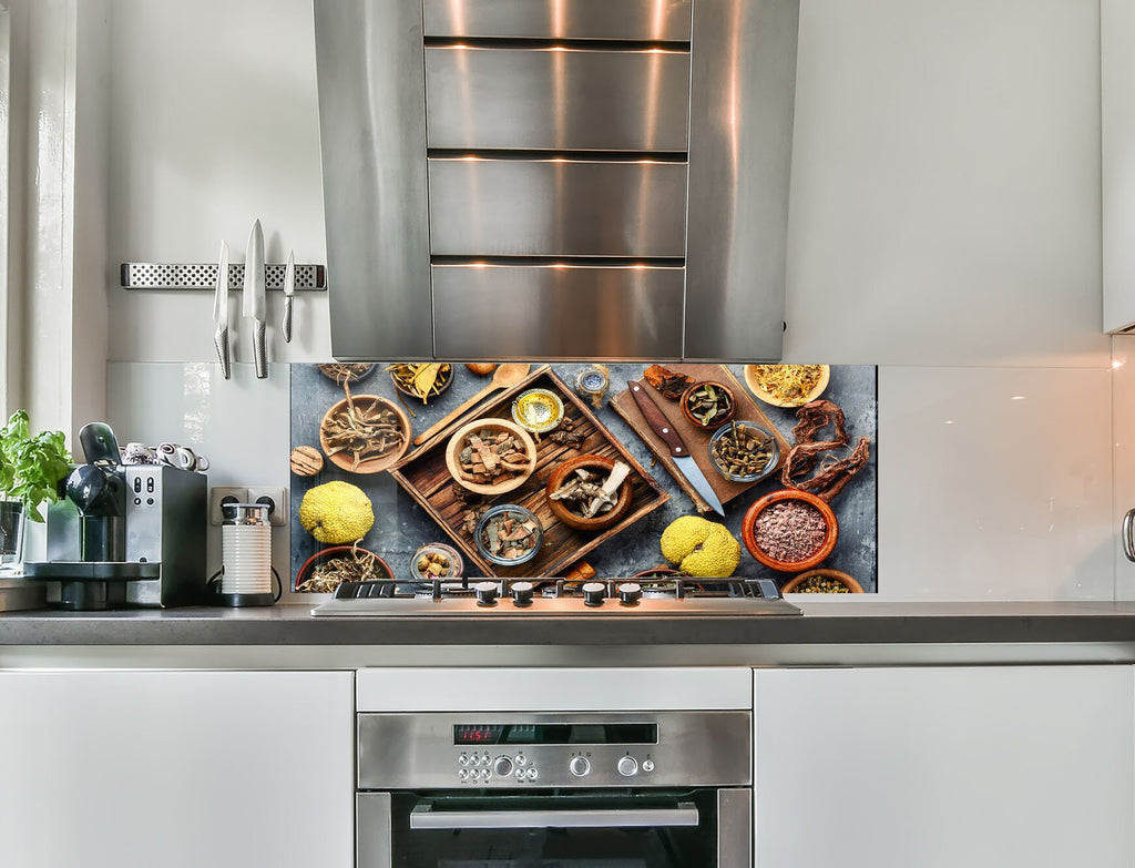 a stove top oven sitting inside of a kitchen