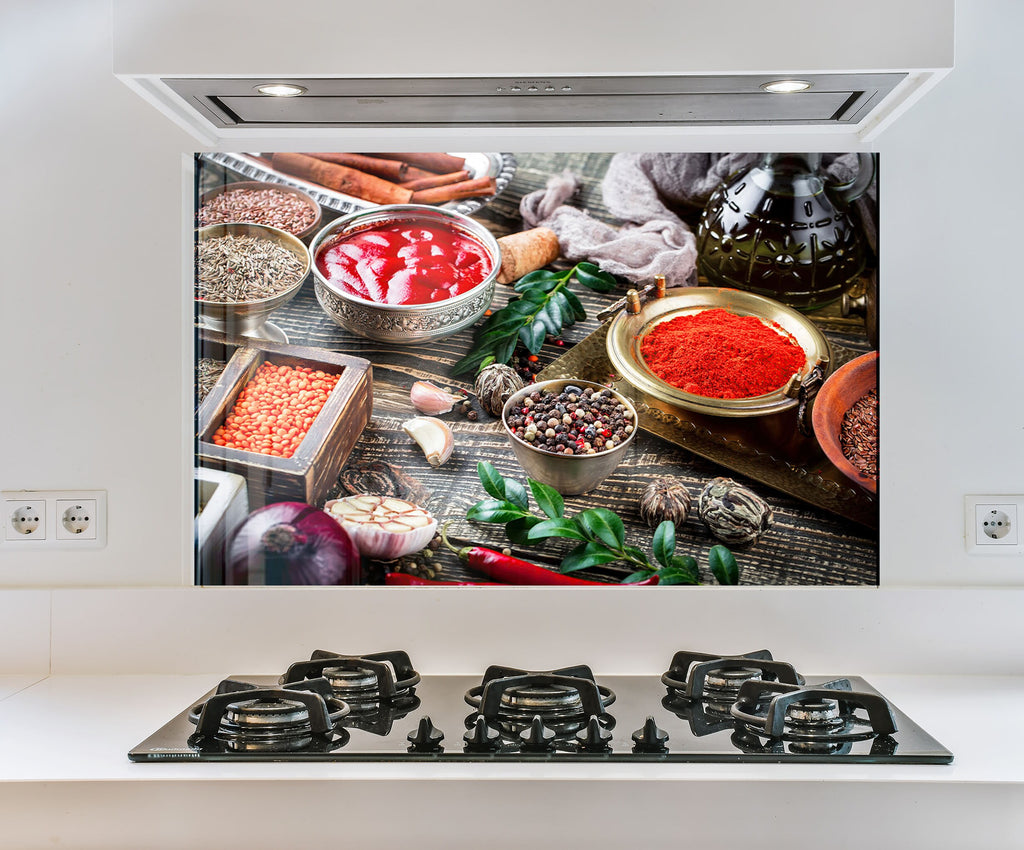 a picture of a kitchen stove with spices on it