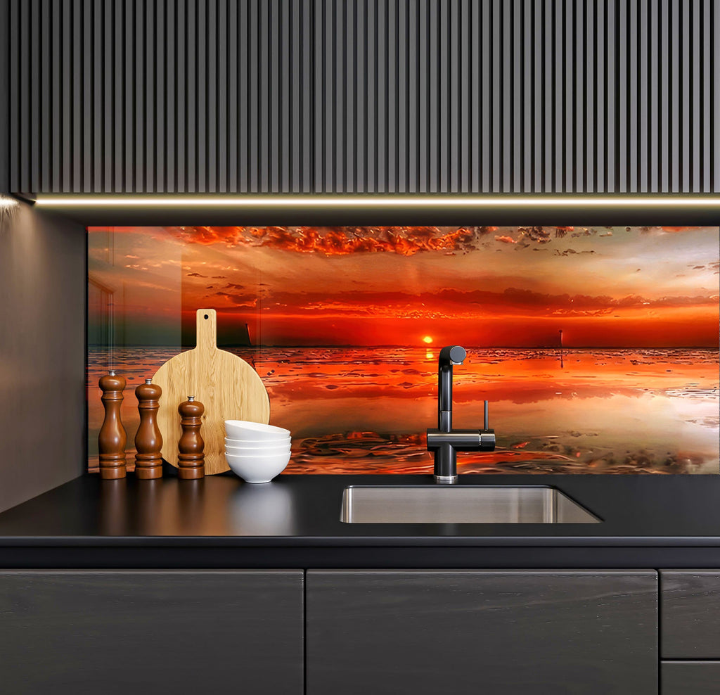 a kitchen with a sink and a painting on the wall