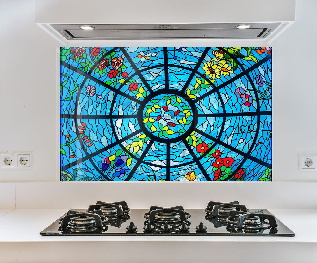 a picture of a stained glass window above a stove