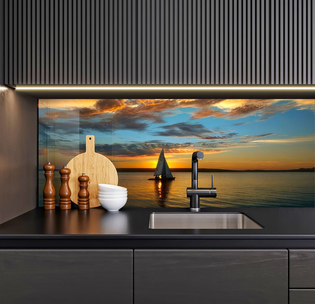 a kitchen with a sink and a wall mural