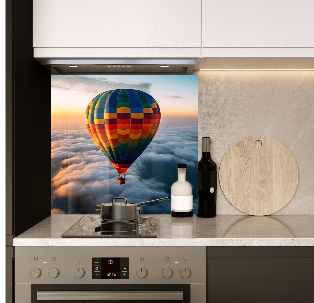 a picture of a hot air balloon above the clouds