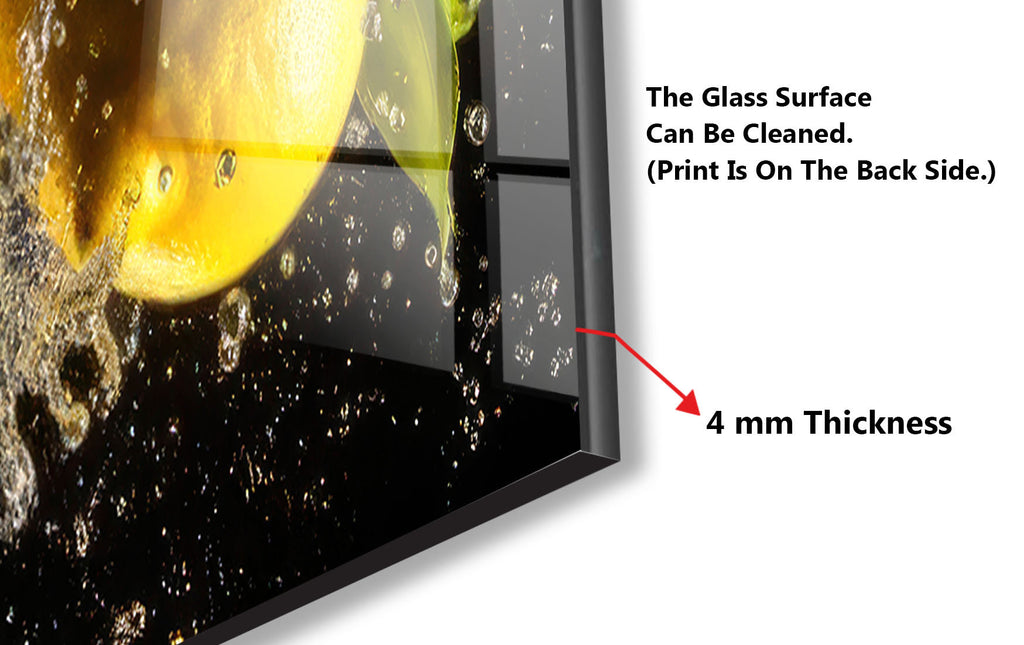 a picture of a lemon being squeezed into a glass