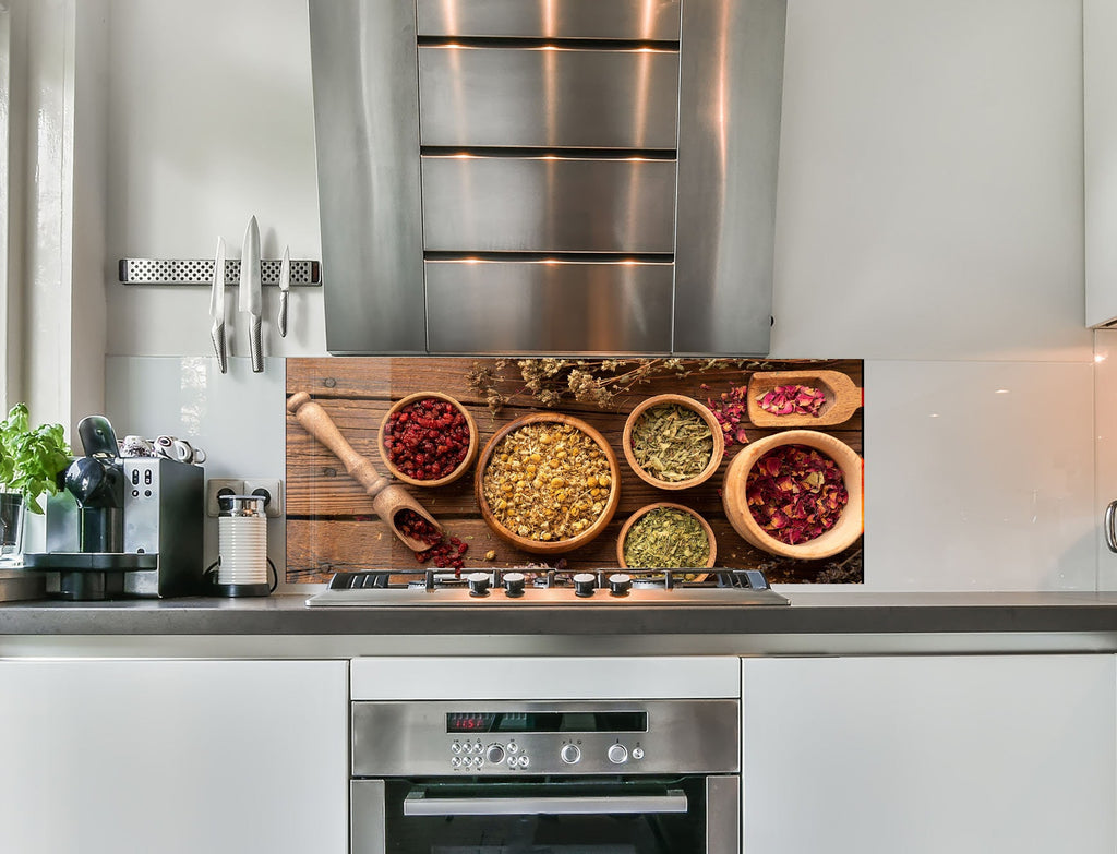 a stove top oven sitting inside of a kitchen
