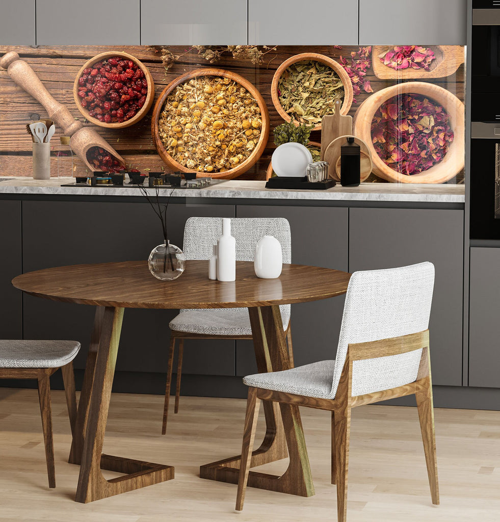 a kitchen with a wooden table and chairs